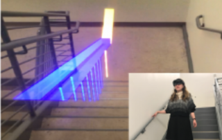A woman uses an AR device to support traveling down the stairs. It displays a blue hologram of the rail next to her.